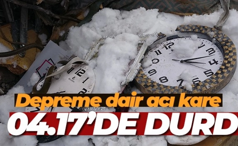 Enkazın altında bulunan duvar saati 04.17'de durmuş