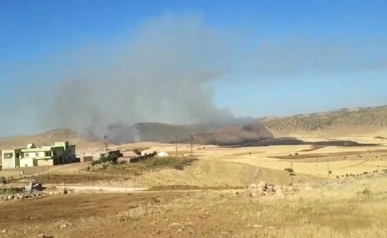 Yangının çıkışında birbirini suçlayan aileler arasında silahlı kavga