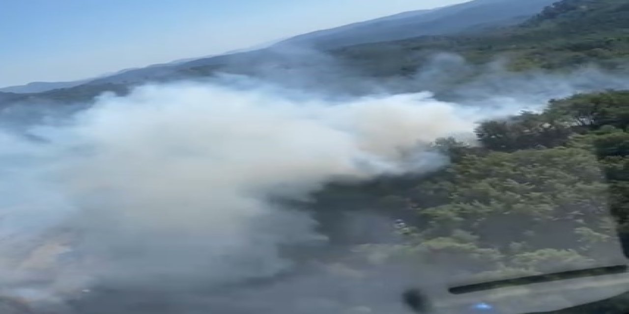 Marmaris'te orman yangını 13 helikopter, 2 uçak, 20 arazözle müdahale ediyor