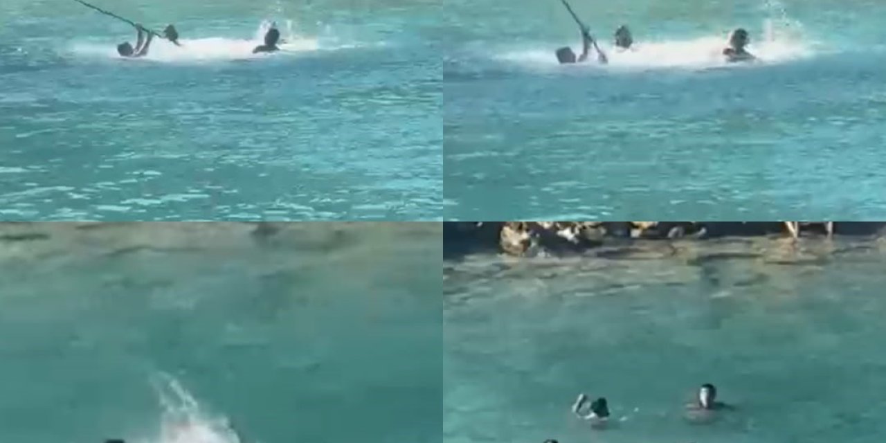 Turistler hayretle izledi, denizin ortasında sopalı kavga turu